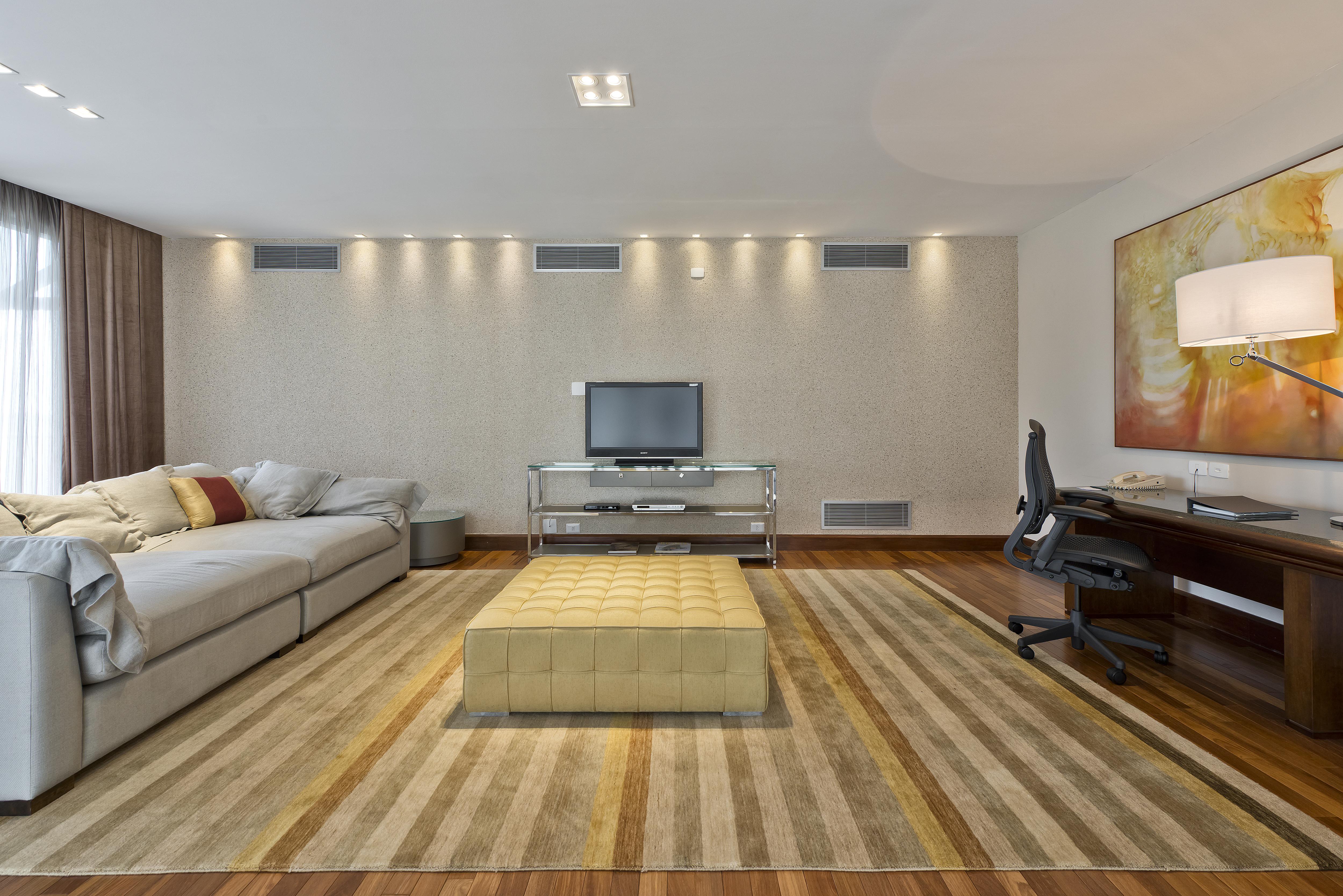 Bourbon Hotel & Suites 库里提巴 外观 照片 A living room with a large area rug