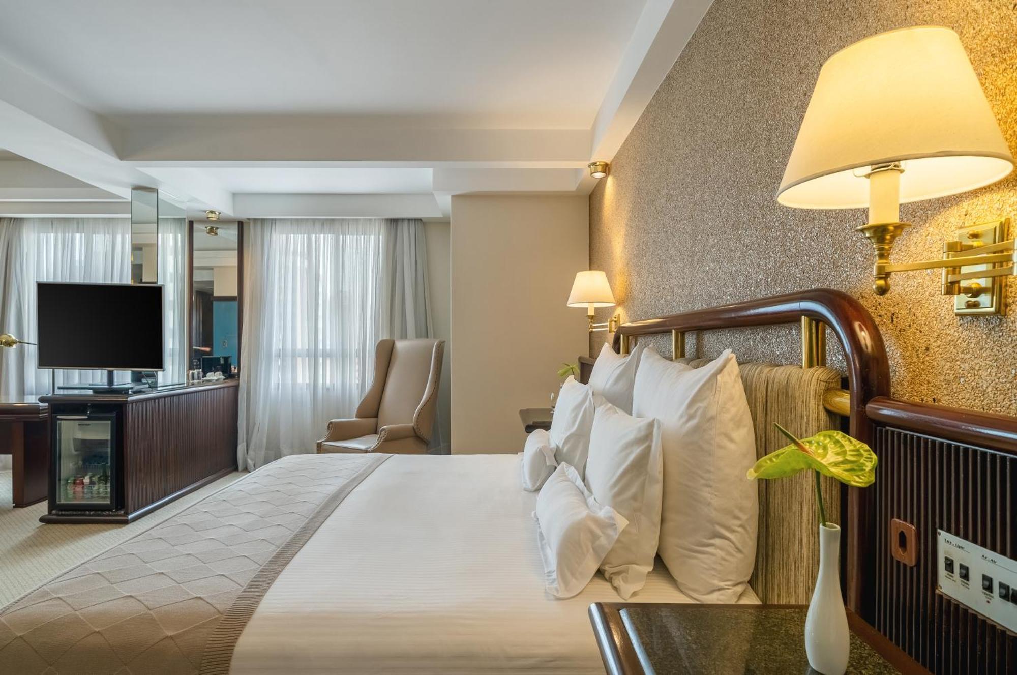 Bourbon Hotel & Suites 库里提巴 外观 照片 A bedroom at the hotel